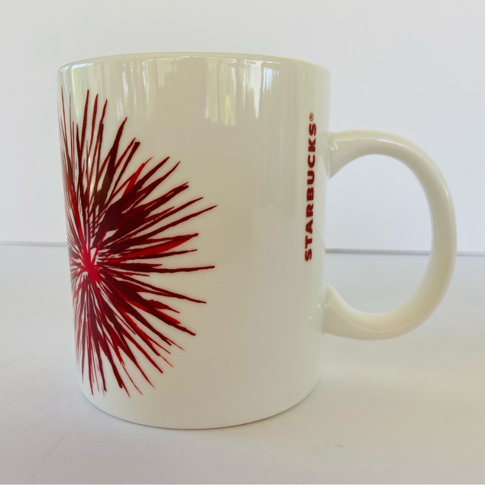 Starbucks 2014 Holiday Red Starburst Coffee Mug 12oz